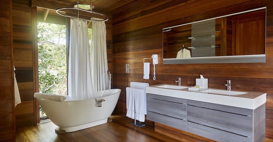 Luxury tropical wooden bathroom designed by InHouse