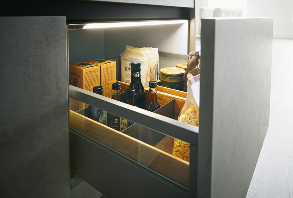Open drawer with in-cabinet lighting